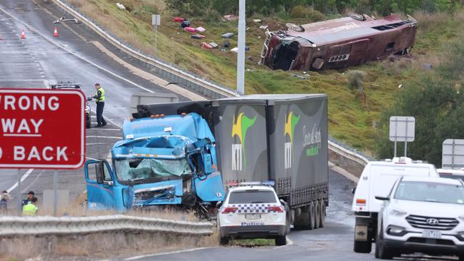 A school bus carrying 32 people flipped on the Western Freeway at Bacchus Marsh in September last year. Picture: Brendan Beckett