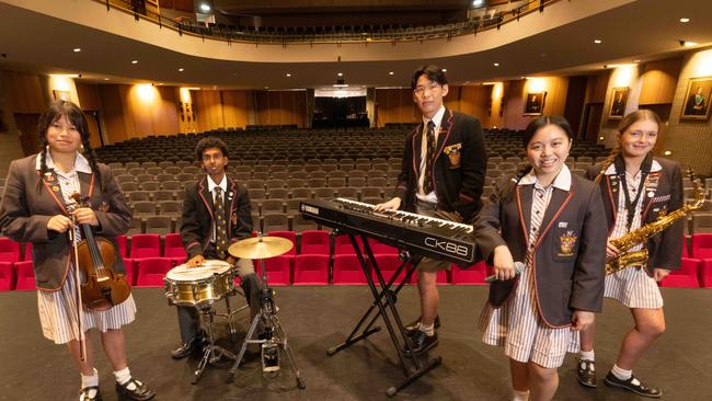 Haileybury College is ranked 8th among Victoria’s top schools. Music students Alexis (singer), Ruby (Saxophone), Raenav (drums), Samantha (Violin) and Joshua (keyboard) with their instruments. Picture: Tony Gough