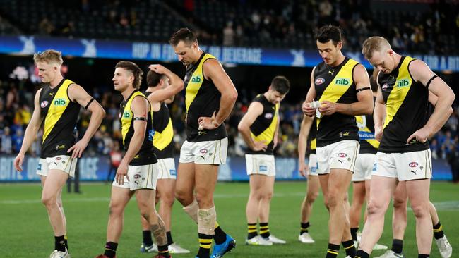 The Tigers look dejected after a the heartbreaking loss to North Melbourne. Picture: Getty