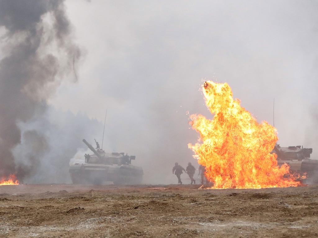 Chinese troops and tanks engage in a recent large-scale combat exercise. Picture: ChinaMilitary
