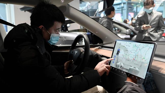 Tesla’s in-car touchscreen displays use Nvidia technology. Picture: Wang Zhao/AFP