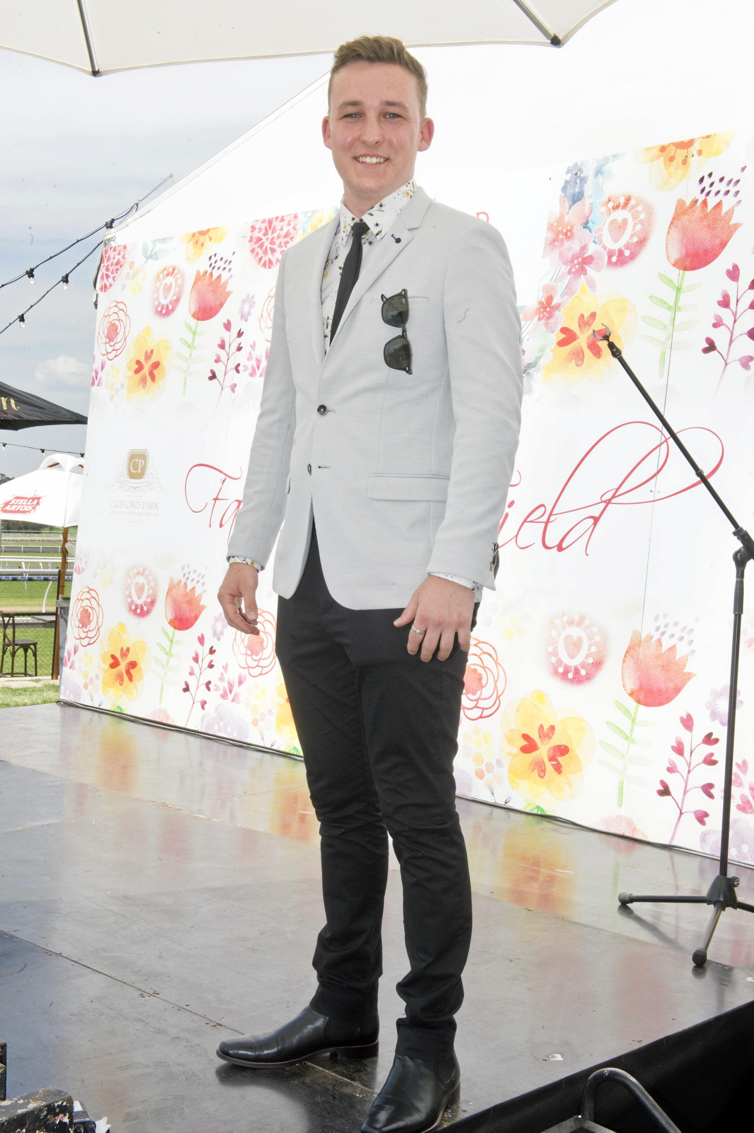 Corey Bellert, winner of mens fashion on the field. Melbourne Cup Day at Clifford Park. Wednesday, 3rd Jan, 2018. Picture: Nev Madsen