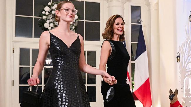 US actress Jennifer Garner and her daughter Violet Affleck arrive at the White House to attend a state dinner honouring French President Emmanuel Macron. (Photo by ROBERTO SCHMIDT / AFP)