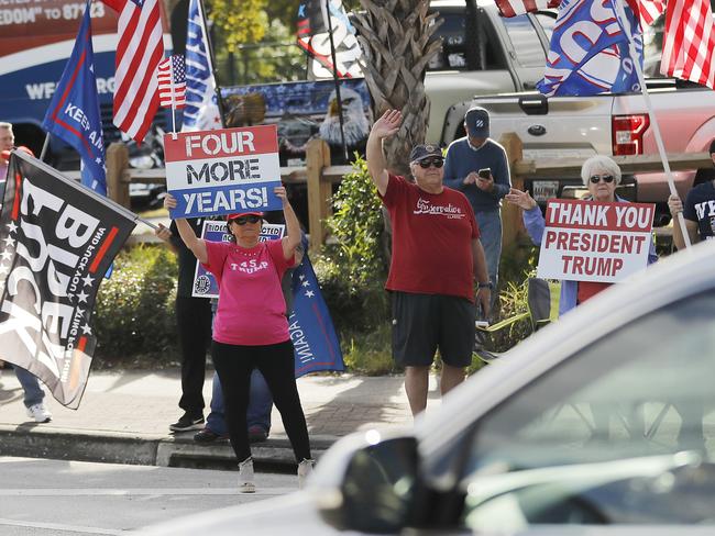 Supporters of Donald Trump lined the streets to see the former president after his arrival in Florida. Picture: Getty Images/AFP