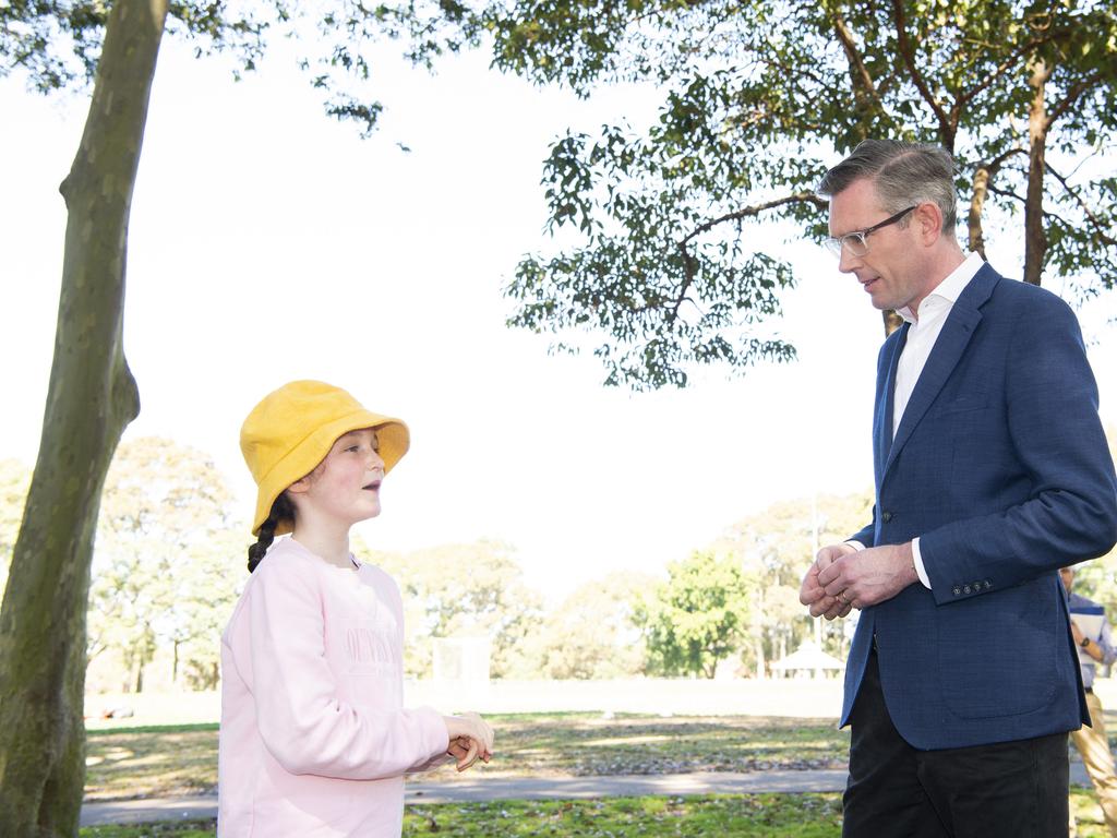 Mr Perrottet was photographed with Education Minister Sarah Mitchell’s daughter Annabelle as he made an announcement about primary school wellbeing. Picture: NewsWire / Monique Harmer