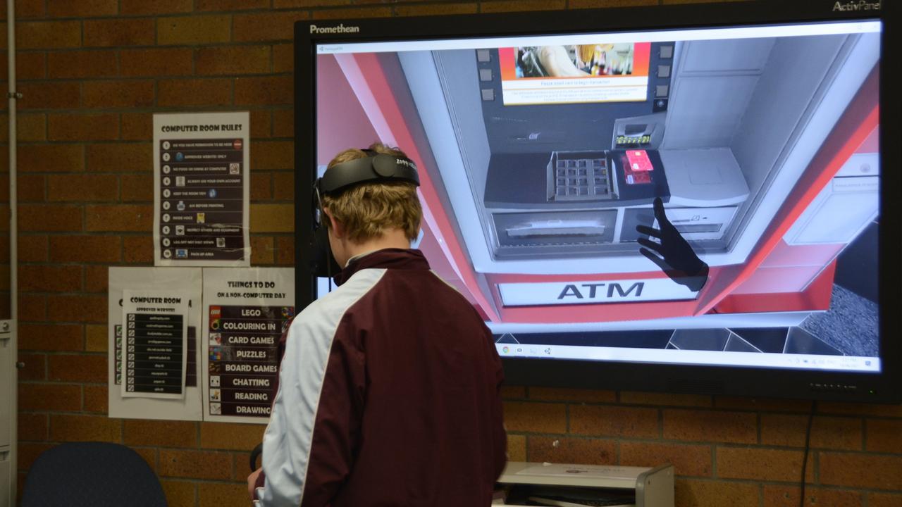 Oakey State High School student Wayne Gemmell using the virtual reality learning hub.