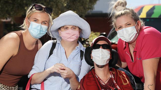 Grace Darragh, Jodie Bryde, Dylon Wright and Karlee Vale mask up to prevent the spread of the Omicron variant of the coronavirus. Picture: Brendan Radke