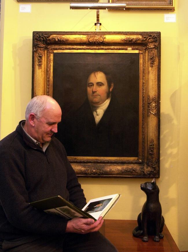 Art collector John Millwood sitting in front of John Glover portrait circa 1835 in Hobart 29/08/02. Pic Renee Nowytarger.