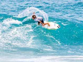 FAMILY TIES: Ty Richardson surfed with his uncle Joel Parkinson to win the Family Teams event at the Eager Beaver surf charity event last year at Palm Beach and will be back for this year's event on January 27. Picture: BEN STAGG/SURFING QLD