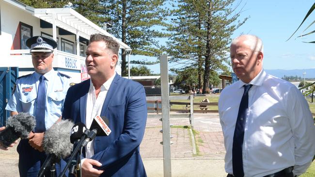 Byron mayor Simon Richardson (centre) and other local authorities have asked Year 12 graduates planning to visit Byron Bay for Schoolies to consider delaying their trip if they can.