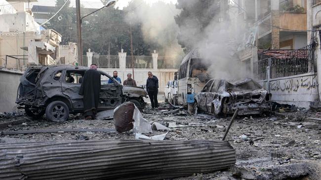 A Syrian regime airforce strike targeted a neighbourhood in Syria's rebel-held northern city of Idlib. Picture: Muhammad Haj Kadour/AFP