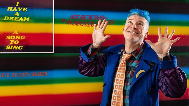 Troy-Anthony Baylis channels Judy Garland for his rainbow-coloured art series Tell Them Their Dreaming. Picture: Saul Steed, AGSA