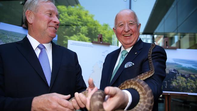 WA Premier Colin Barnett and Rio Tinto CEO Sam Walsh with a Rough Scaled Python during a visit to the Kimberley. Photo: Colin Murty