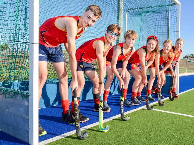 L-R: Joshua Ucinek, Owen Geoghegan, Coell Williams, Molly Dwyer, Emily Holland, Ella Bruce at West Beach, who are part of the National Under-15 hockey championships, Tuesday, April 6, 2021. Picture: Brenton Edwards