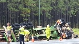 Logging truck rollover on the Tin Can Bay Road, Monday December 14, 2020