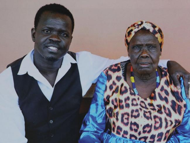 Ayik Chut with his mother Achol Aguin Majok.