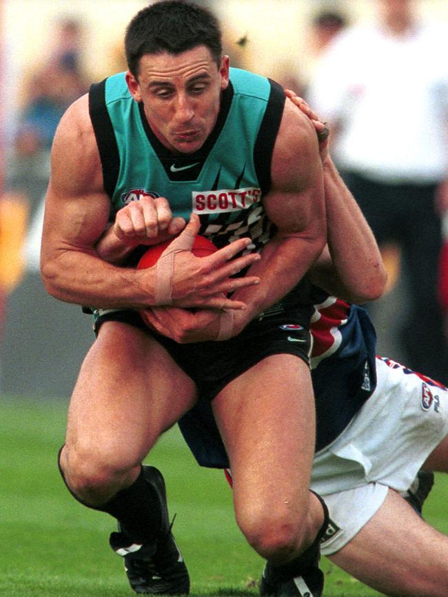 Port Adelaide’s inaugural AFL club champion Darren Mead in action.