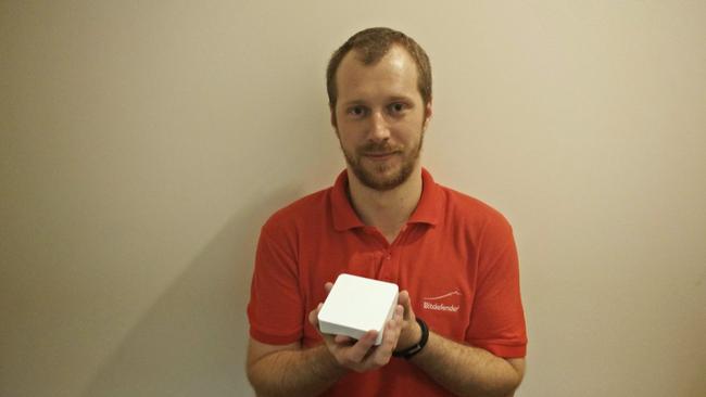 Bogdan Botezatu, senior e-threat analyst at Bitdefender, with the Box - a device that stops hackers from entering your home network via a fridge or other connected device.