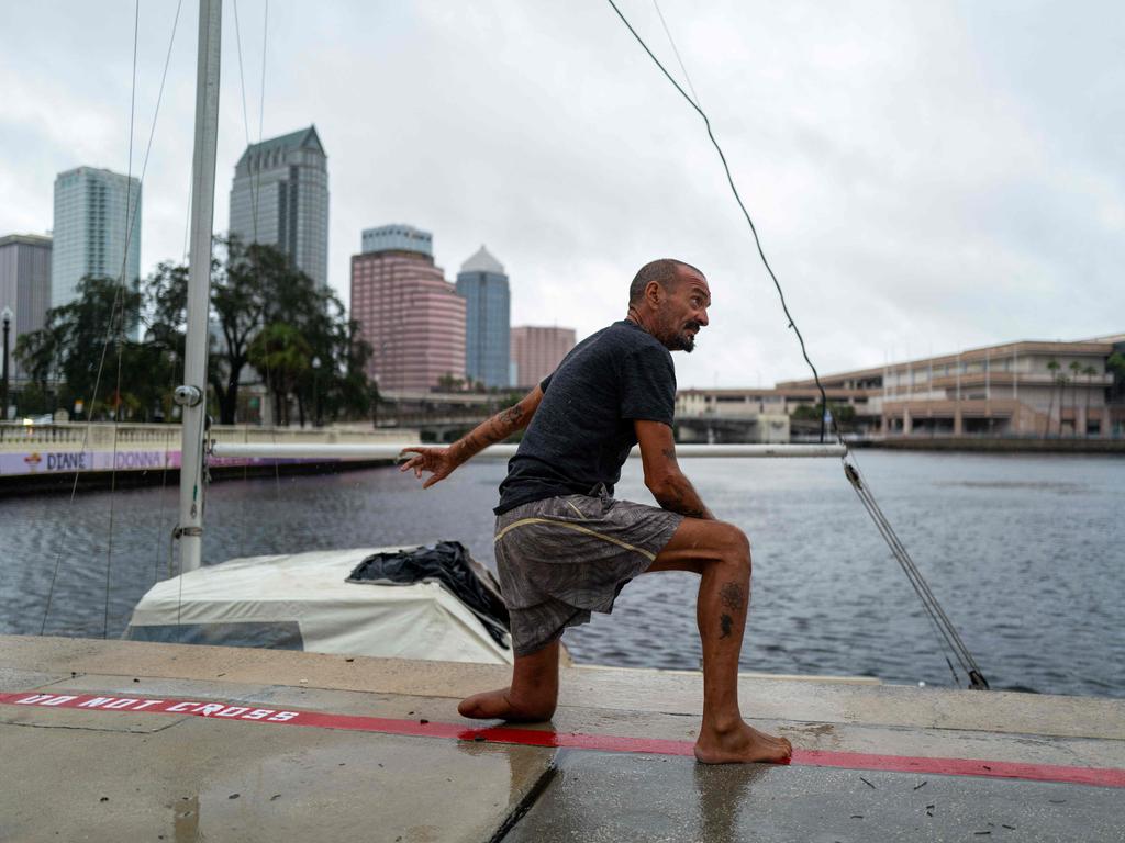 Police tried in vain to get Lieutenant Dan to leave his boat behind and seek shelter. He refused, and survived unscathed. Picture: Spencer Platt/ Getty Images