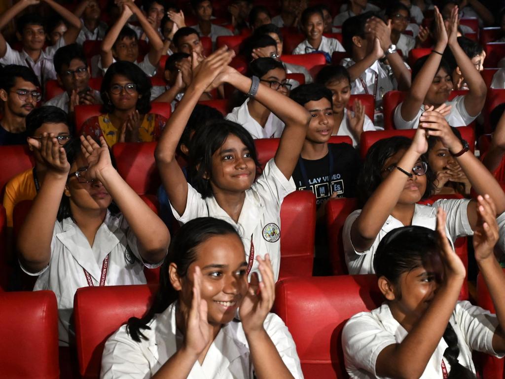 Students celebrate as they watch the live streaming of the launch. Picture: Dibyangshu Sarkar/AFP