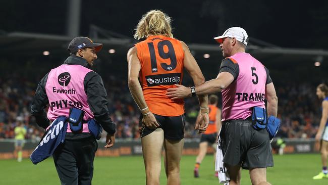 Nick Haynes is helped from the field after his hamstring injury. Picture: Getty Images