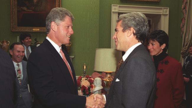 Ghislaine Maxwell watches as Jeffrey Epstein and US President Bill Clinton shake hands. Picture: William J. Clinton Presidential Library