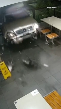 Man ploughs car through McDonald's before horrific attack