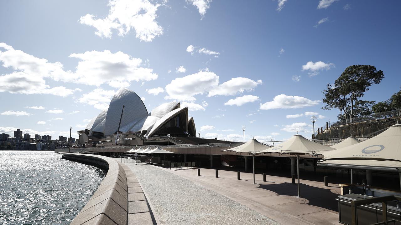 Usually one of the busiest places in Sydney, the empty Opera House forecourt earlier this month. Picture: Ryan Pierse/Getty Images.