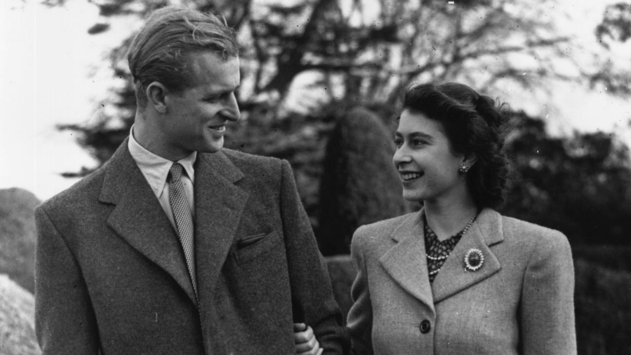 Elizabeth and Prince Philip enjoying a walk during their honeymoon at Broadlands, Romsey, Hampshire. Picture: Getty Images