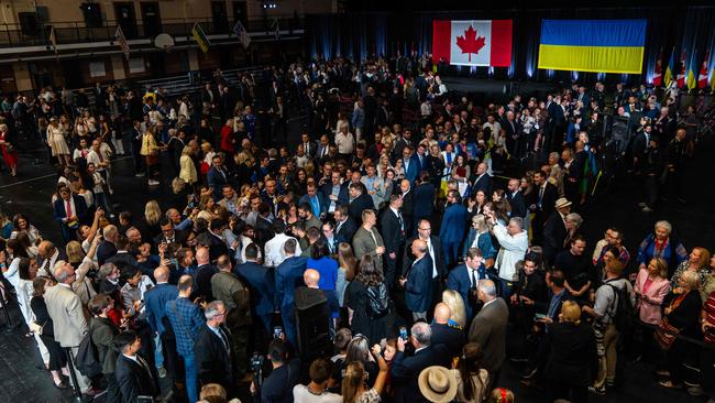 People wait to shake hands with Ukrainian President Volodymyr Zelensky and Canadian Prime Minister Justin Trudeau during a Ukrainian-Canadian rally at Fort York. Picture: KY Cheng/Getty Images/AFP