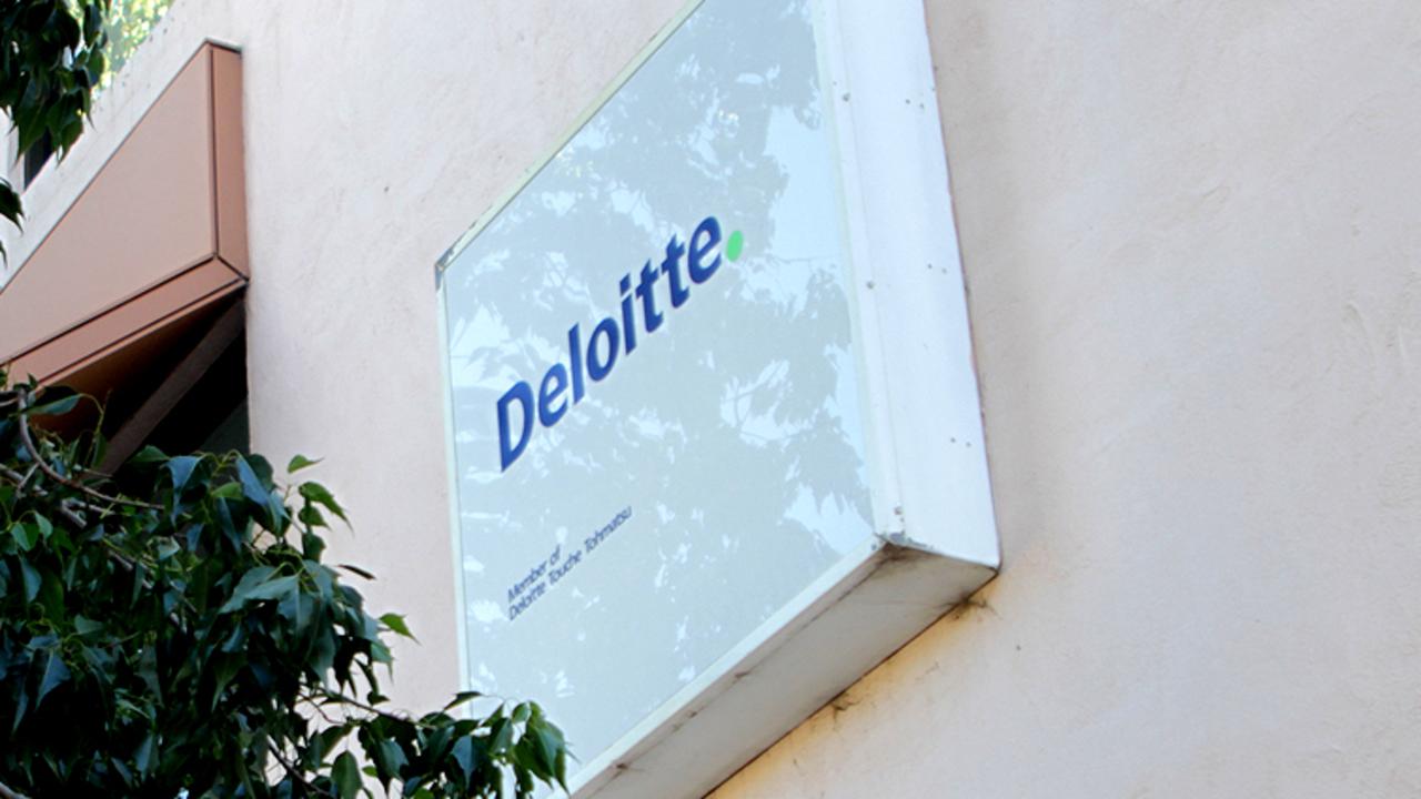 Deloitte axes partners amid spending hit