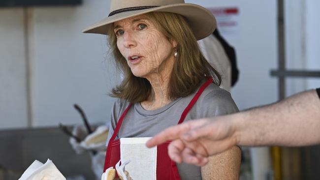 CANBERRA, AUSTRALIA, NewsWire Photos. FEBRUARY 25, 2024: U.S. Ambassador Caroline Kennedy, husband Edwin Schlossberg along with the U.S. Embassy team cook and serve sausages at Bunnings, Majura Park in Canberra to raise funds for the Cancer Council ahead of her participation in the Autumn Shitbox Rally. Picture: NCA NewsWire / Martin Ollman