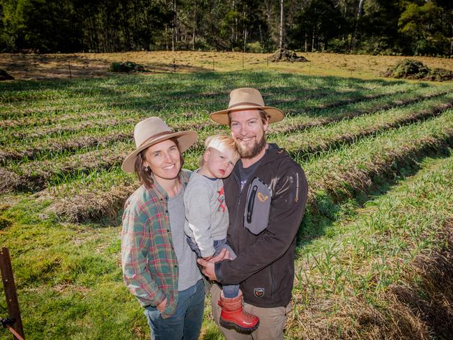 Justine Ward, Brett Dawson and their son Noah Dawson of Waterholes Garlic at Waterholes. Picture: Laura Ferguson.