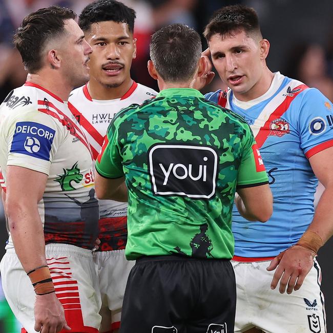 Victor Radley talks to referee Adam Gee during Anzac Day clash.