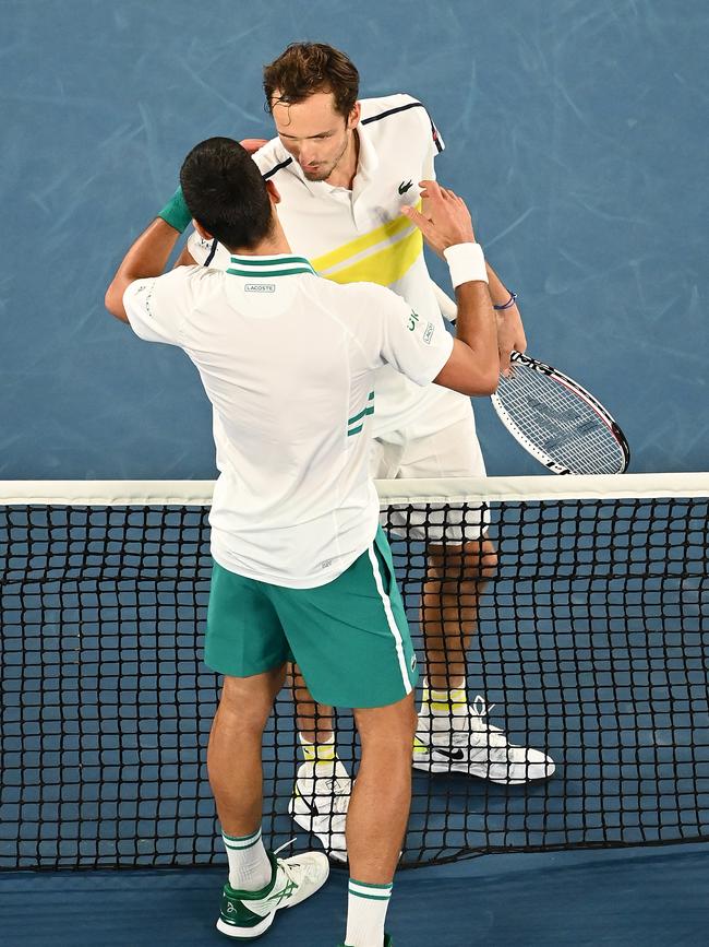 Friendly rivals ... Daniil Medvedev (top) congratulates Novak Djokovic. Picture: Getty Images