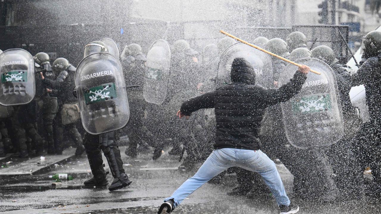 Demonstrators clashed with security forces outside Congress. Picture: Luis Robayo / AFP