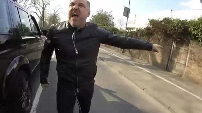 The furious driver threatens to eat the cyclist for breakfast