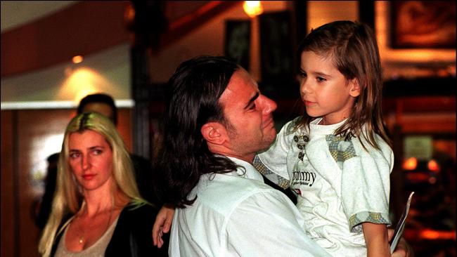 Miroslav Mlinar farewells his wife and son Stefan at Sydney Airport in March, 1999 as he prepares to return to Yugoslavia. Picture: Alan Pryke