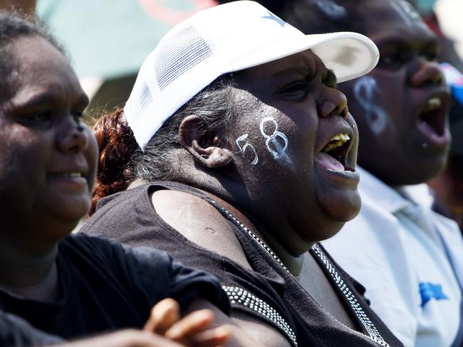 Muluwurri Magpies fans cheer on their team against Tuyu Buffaloes in the Tiwi Islands Football League grand final on Bathurst Island. PICTURE: Elise Derwin