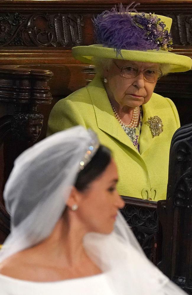 The Queen looks on as Meghan Markle weds Prince Harry. Picture: AFP.