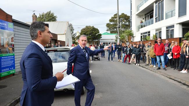 Despite the market downturn, buyers are still being priced out at Melbourne auctions. Picture: Nicki Connolly