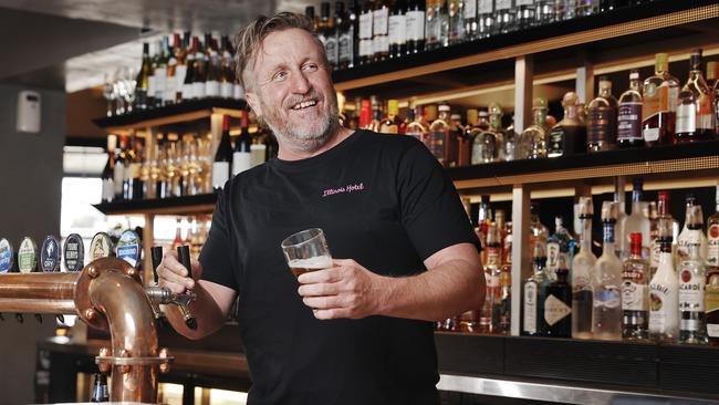 Bill Young, owner of the Illinois Hotel in Five Dock, toasts to the easing of restrictions. Picture: Sam Ruttyn