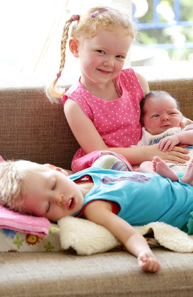 The Mills family from Newport pictured just after Rosie Bea was born last October, with older sister Ruby and brother Roki.