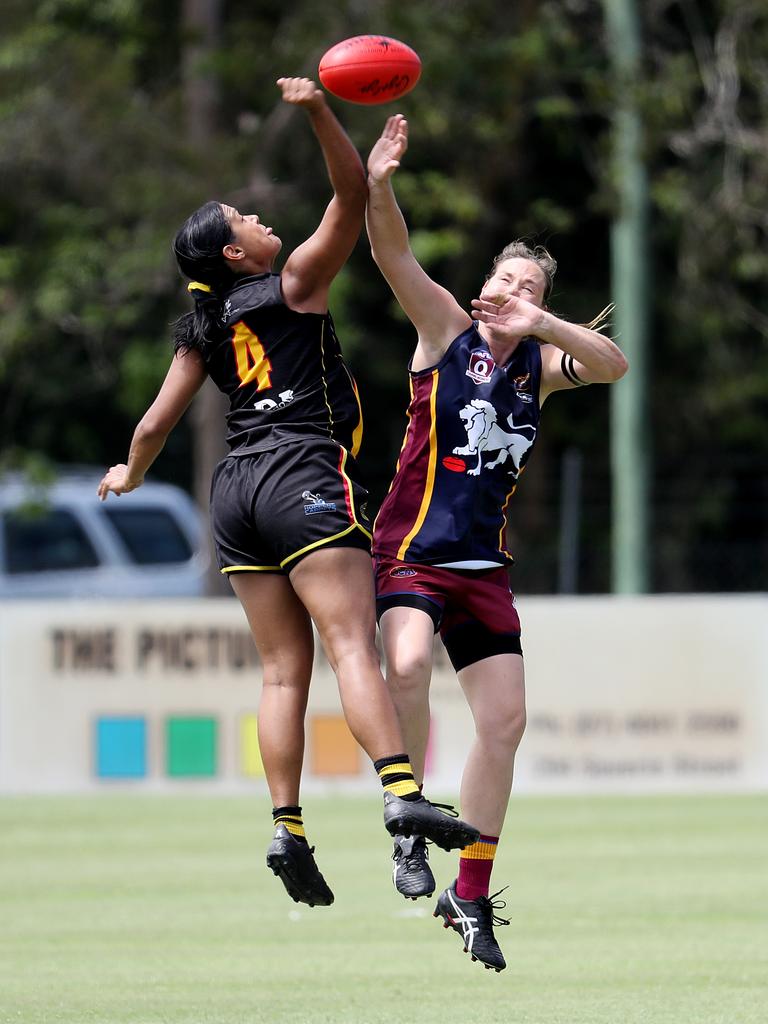 AFL Cairns Womens, Round 1: North Cairns v City Lions at Watsons Oval. Tigers' Alinta Batten and Lions' Talitha Aynsley. Picture: Stewart McLean