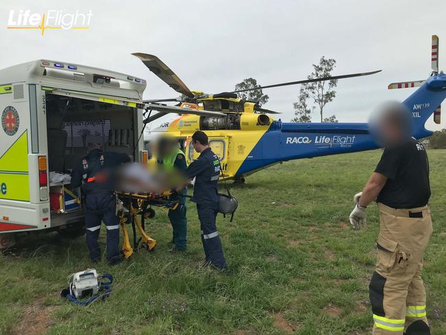 Lifeflight Rescue helicopter on scene at a rollover near Dulacca. Photo: RACQ LifeFlight