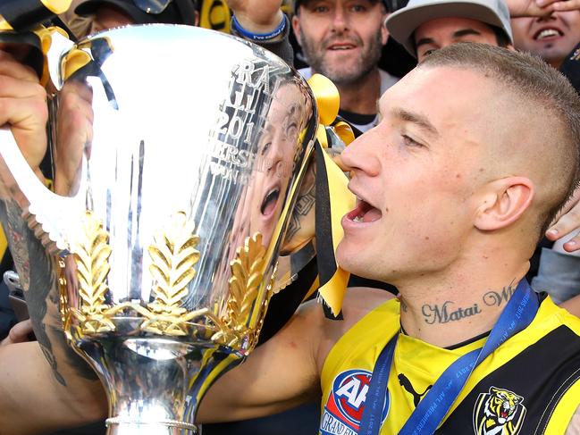 MELBOURNE, AUSTRALIA - SEPTEMBER 30:  Dustin Martin of the Tigers celebrates winning the 2017 AFL Grand Final match between the Adelaide Crows and the Richmond Tigers at Melbourne Cricket Ground on September 30, 2017 in Melbourne, Australia.  (Photo by Cameron Spencer/AFL Media/Getty Images)