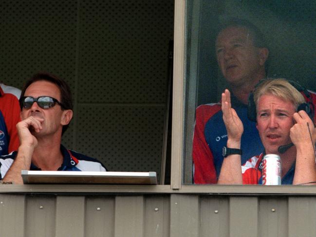 Terry Wallace and David Noble watch on from the Bulldogs box.