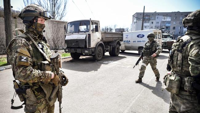 Russian soldiers patrol a street in Volnovakha in the self-proclaimed Donetsk People's Republic. Picture: AFP