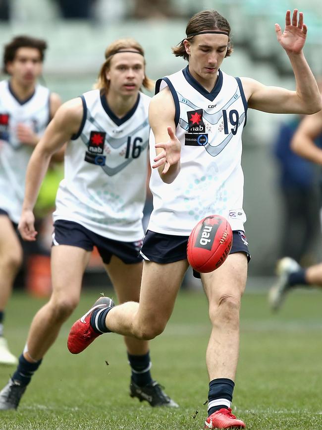 Sam Fletcher of Vic Country kicks during the U18 nationals at the MCG last year. 