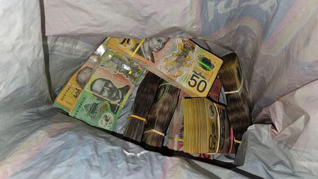 Police found stacks of cash during some warrants. Picture: NSW Police